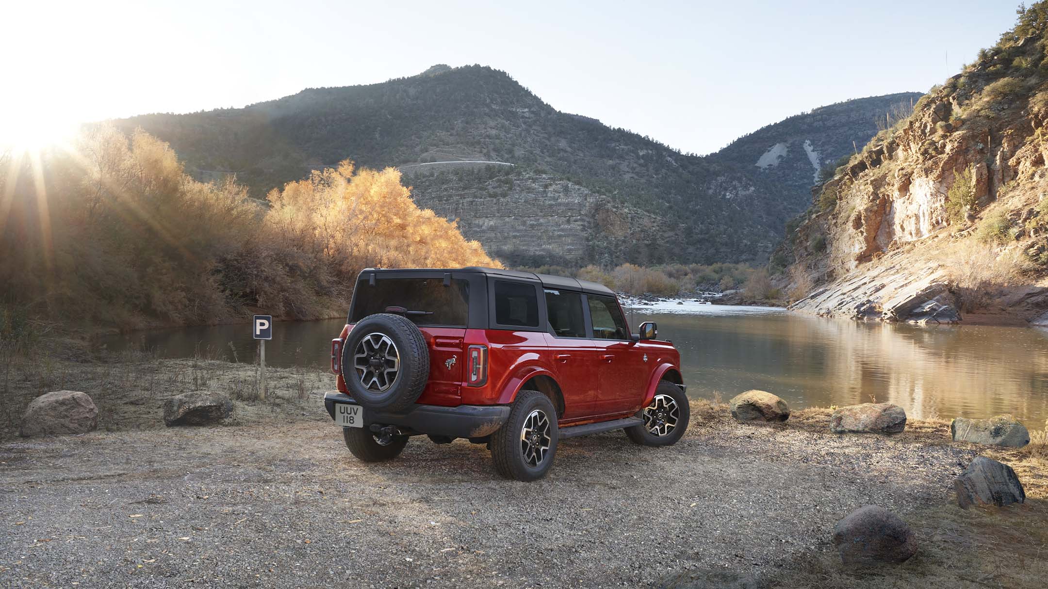 Ford Bronco from back parked by water