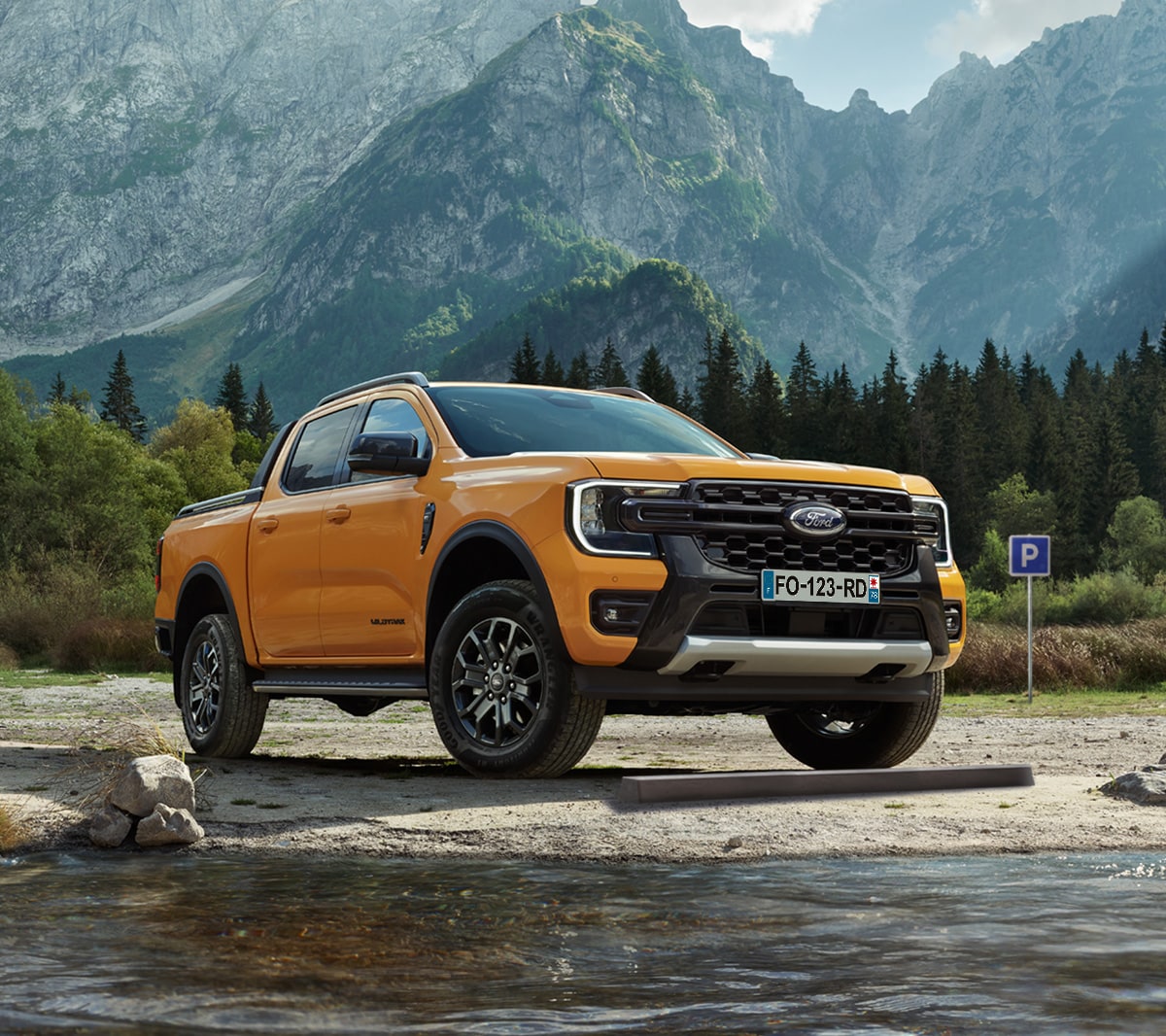 All-New Ford Wildtrak parked near mountains 3/4 front view