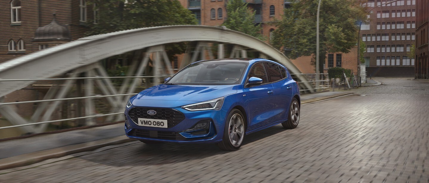 Ford Focus driving on a bridge