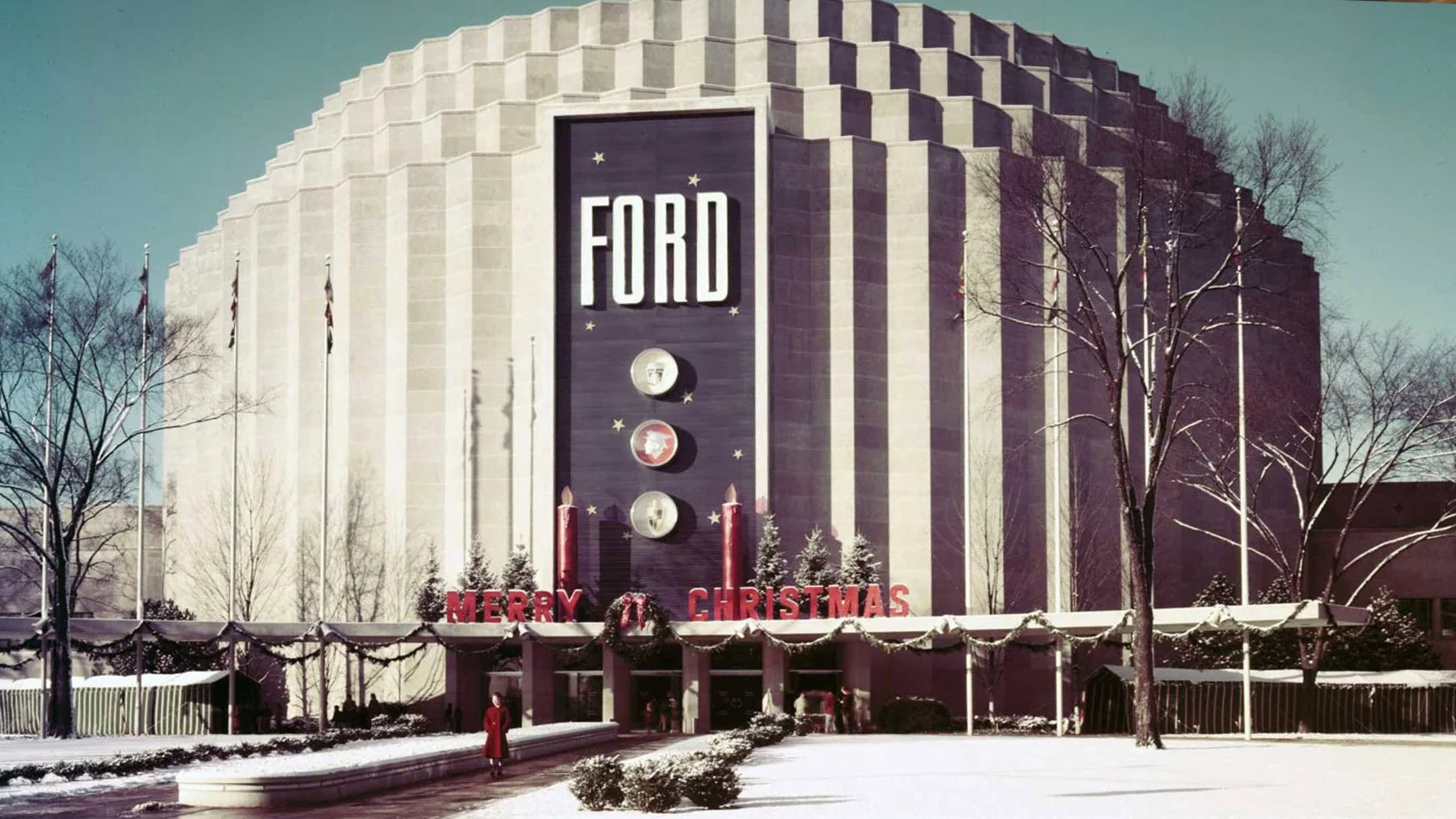 ford factory with merry christmas sign on the front
