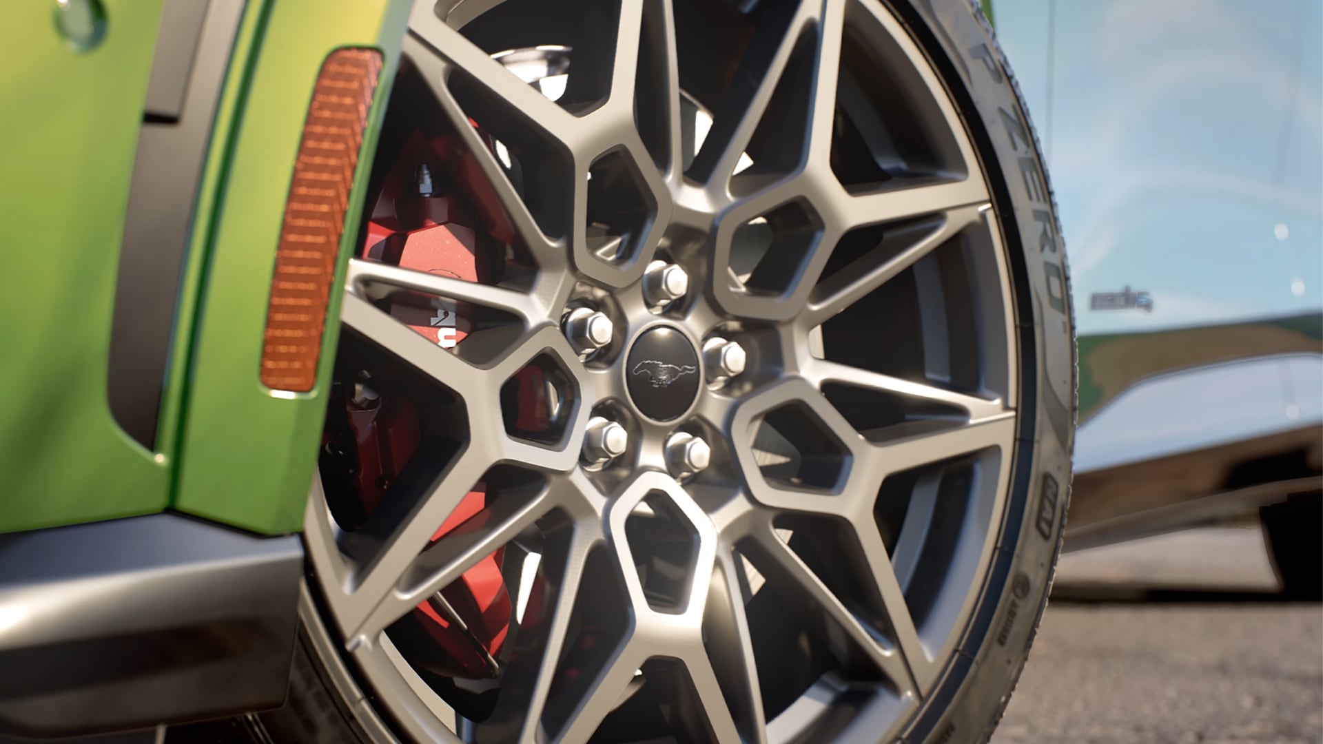 Gros plan de la Ford Mustang Mach-E montrant les jantes en alliage 20" en fonte d’aluminium Carbonised Grey.