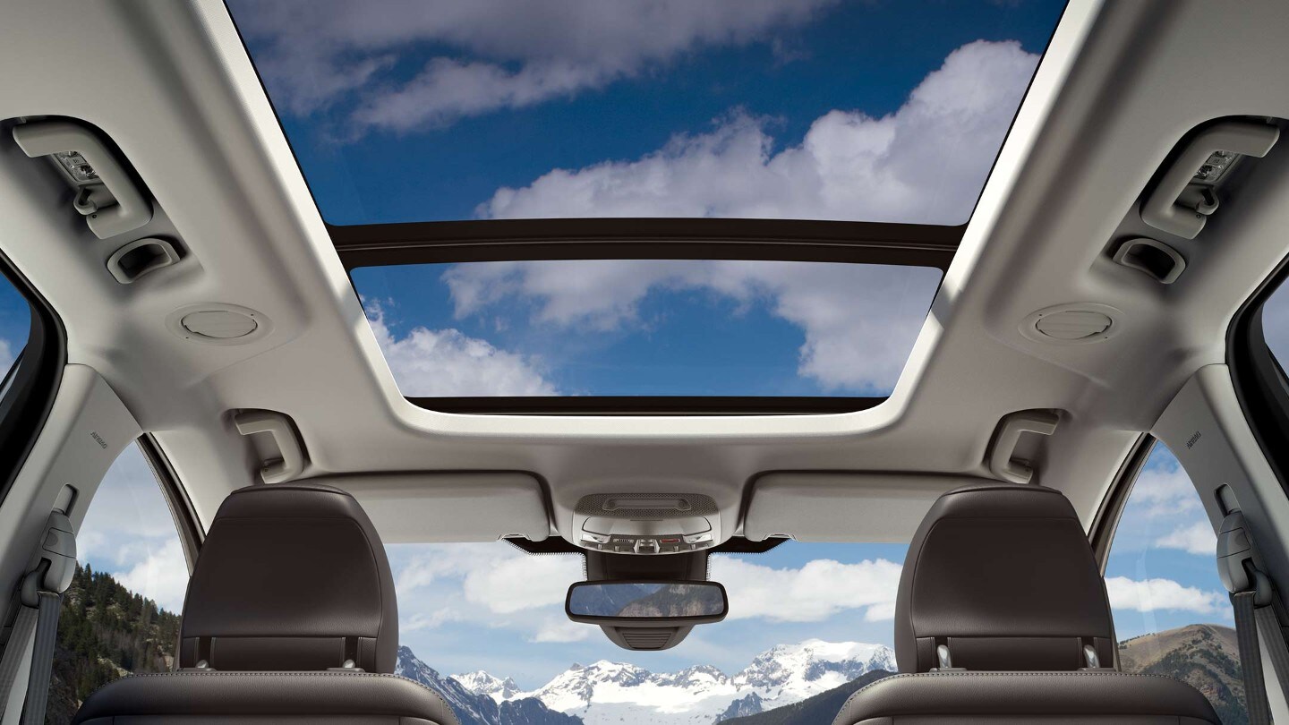 Ford Galaxy sunroof with clouds in the sky