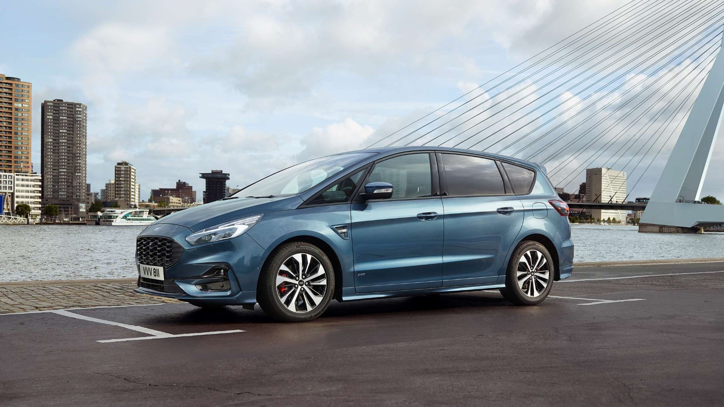 Ford S-MAX in blue parked by river and bridge