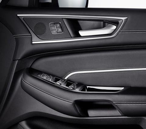 Ford S-MAX Vignale interior showing the driver's doors with in-door controls