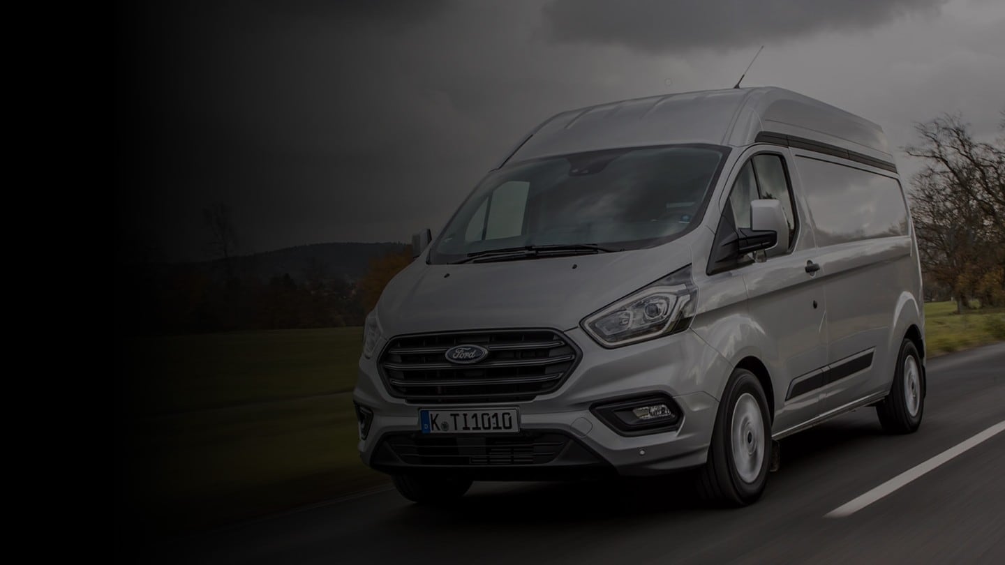 Ford Transit Custom driving on rural road