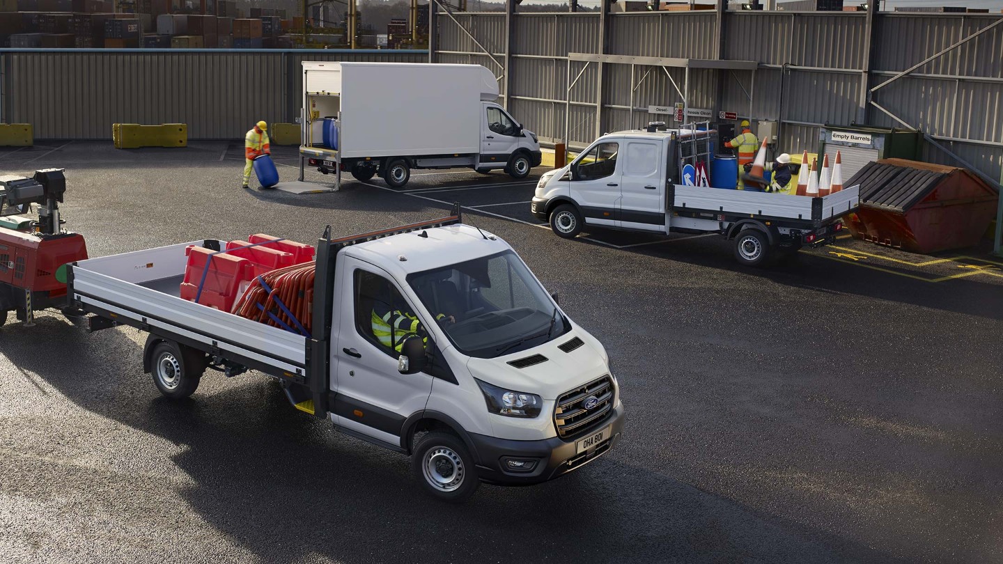 Car park with various Ford Transit Chassis Cabs