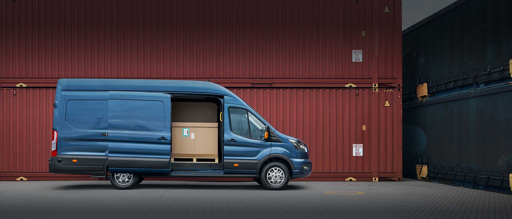 New Blue Ford Transit Van side view with side door open 