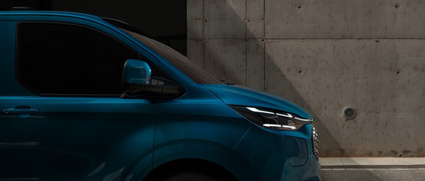 Ford E-Transit Custom in blue side view close-up