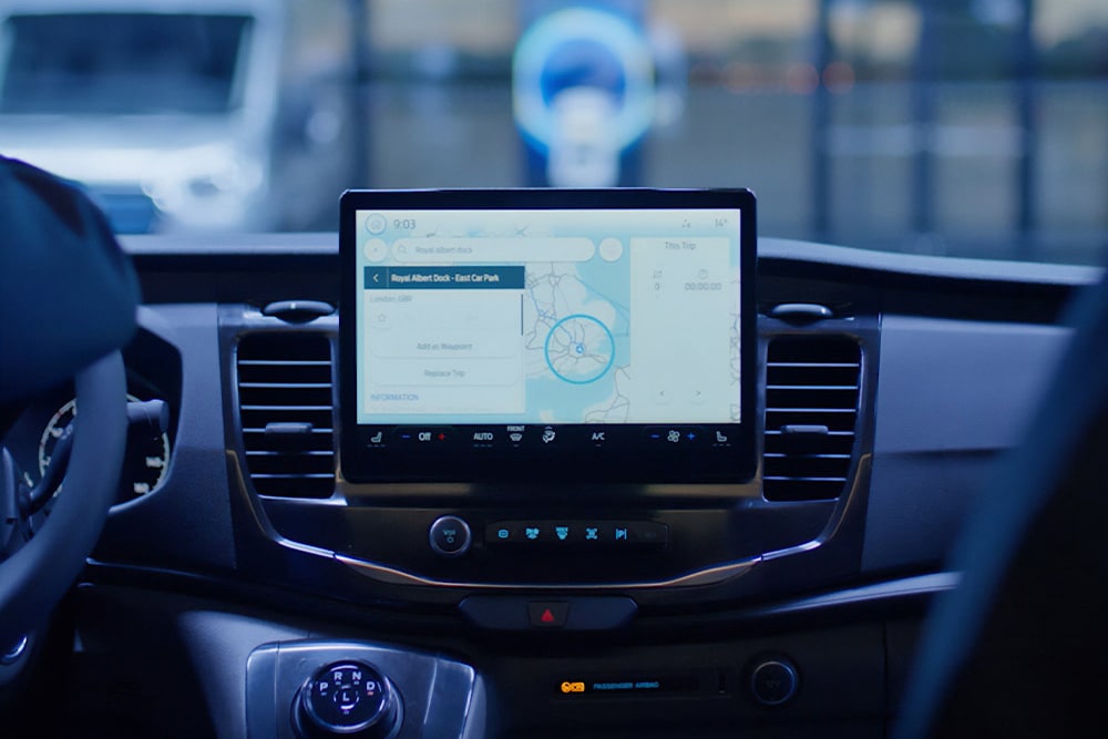  Dashboard of a Ford Transit van with a navigation system.