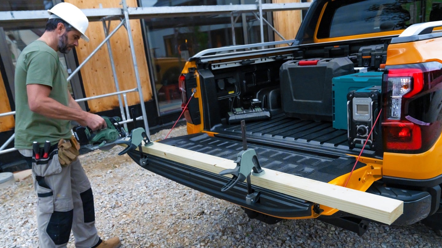 All-New Ford Ranger moondust silver 3/4 rear view from above showing load bed