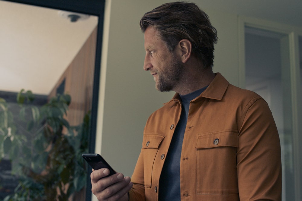 Client Ford utilisant un appareil mobile