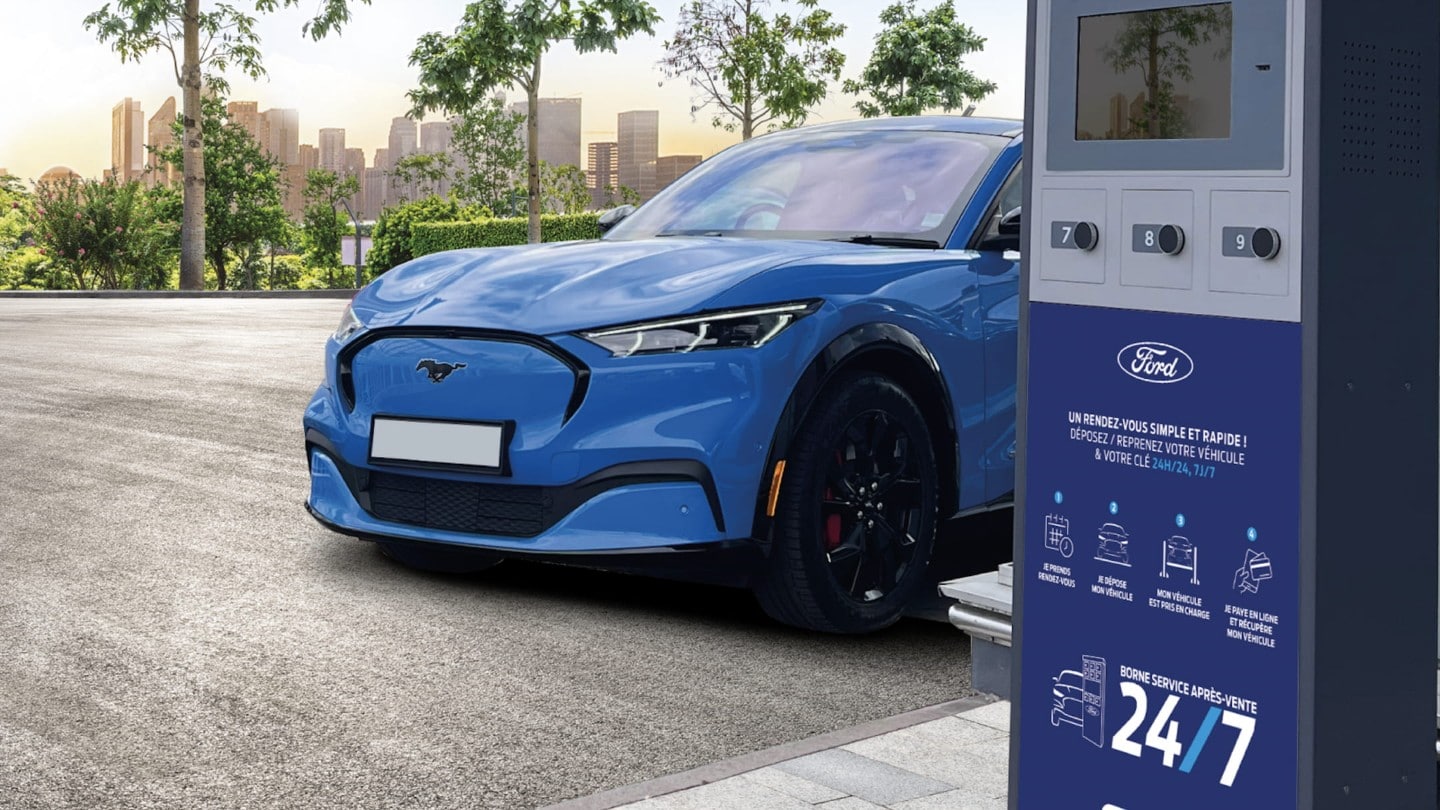 Lady using the 24-hour key drop