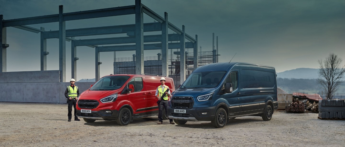 Two Ford commercial vehicles standing on construction site